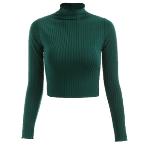 Detailed view of the dark green ribbed knit fabric on a slim mock neck crop top