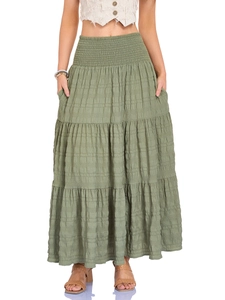 Grass green high waisted smocked maxi skirt with pockets and tiered bohemian design