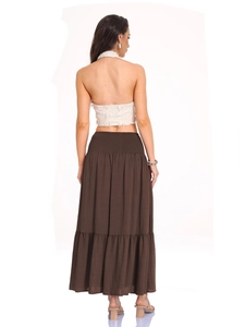 Detail view of the bohemian long brown tiered skirt with elastic smocked high waist design