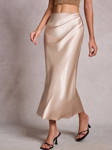 Elegant champagne satin midi skirt with side ruching and glossy silk-like finish