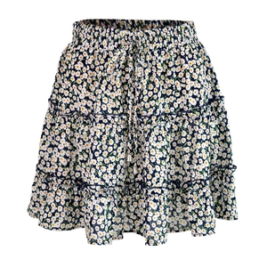 Detail view of navy blue floral mini skirt with tiered ruffles and drawstring waist