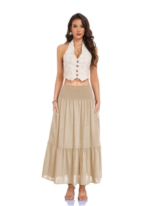 Detail of khaki high-waisted maxi skirt with elastic smocked waist and side pockets