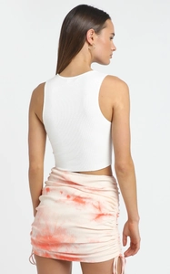 Detail of drawstring ruching on tie-dye ribbed knit mini skirt for women