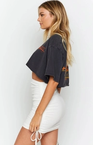 Detail of adjustable side drawstring and ruched texture on white high waist bodycon skirt
