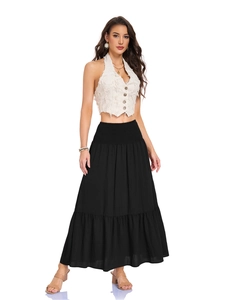 Close-up of a high-waisted black maxi skirt with elastic waistband and pocket detail