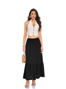 Detail of high waisted maxi skirt with smocked elastic waist and pocket design