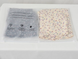 Floral chiffon skirts in S size packaging with a secure translucent zip-lock bag