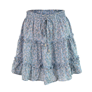 Detailed view of light blue floral mini skirt with tiered ruffles and elastic drawstring waist
