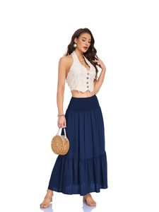 Detail view of navy blue tiered maxi skirt with elastic high waist and side pockets