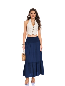 Detail of high waisted navy blue tiered maxi skirt with elastic smocked waist and pockets