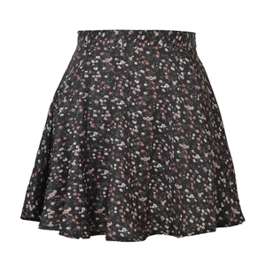 Detail of high-waisted floral mini skirt in black chiffon with a flared A-line silhouette