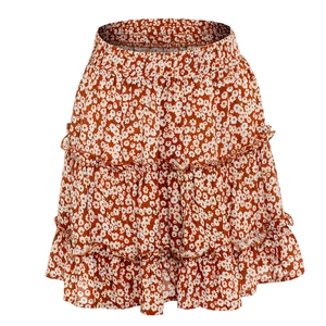 Detailed view of tiered floral mini skirt with ruffled edges and elastic high waist