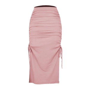 Detail of mauve ribbed high waist skirt featuring drawstring sides and ruched texture