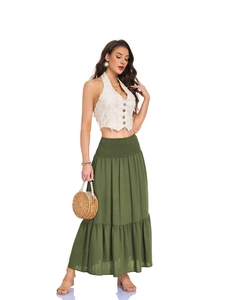 Detail of high waisted olive green maxi skirt with elastic smocked waist and side pockets
