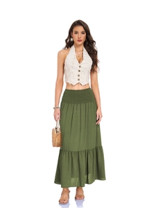 Detail of high waisted green pleated A-line skirt with functional side pockets