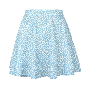 Detail of high-waisted light blue floral skirt featuring white star floral patterns