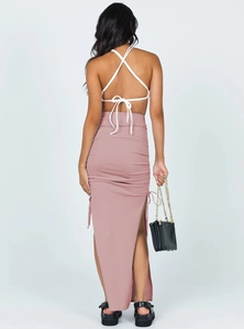 Detail of high waist dusty pink knitted skirt with side drawstring ruched slit back view