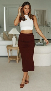 Detail of side ruching and drawstring on a slimming high-waist knit skirt for women