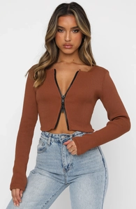 Detail of ribbed knit brown long sleeve top with functional black double-way zipper