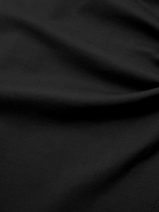 Vue détaillée de la texture plissée et du tissu en maille noir de haute qualité