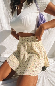 Detail of floral chiffon A-line skirt with high waist and invisible zipper design