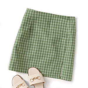 Mini jupe écossaise verte à coupe trapèze avec taille haute et fente latérale
