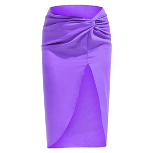 Detail of elegant bright purple satin skirt with waist knot and front high slit