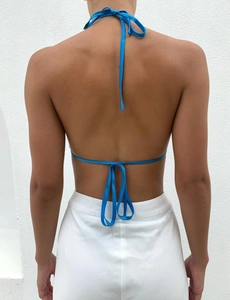 Detail of blue satin halter top with adjustable neck and back ties for an open back look