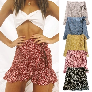 Floral ruffle high waist mini skirt with wrap tie side available in six colors