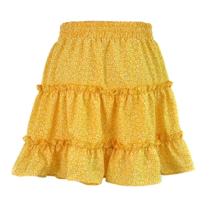 Detail of high waisted yellow floral mini skirt with triple layered ruffle design