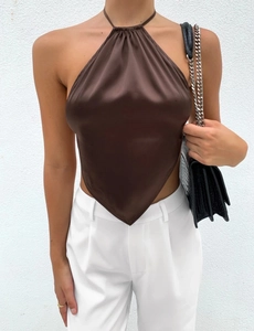 Detail view of brown satin halter top featuring a glossy finish and triangular hemline