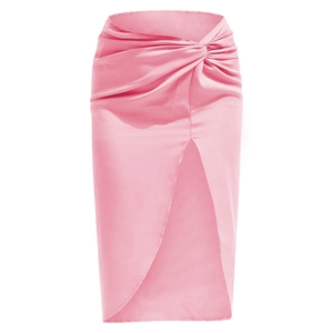 Detail of pink satin midi skirt featuring a twisted knot waist and high side slit