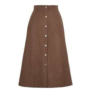 Detailed view of dark brown corduroy maxi skirt with single-breasted button-up high waist