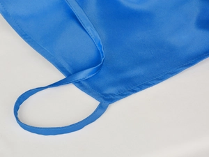 Detailed close-up of royal blue satin halter top showing fine stitching and silk ties