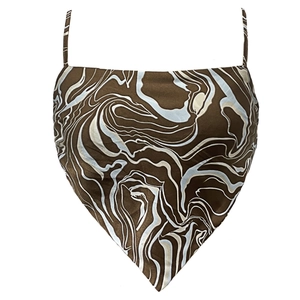 Detail of bandana style crop top with blue and white marble print and thin straps