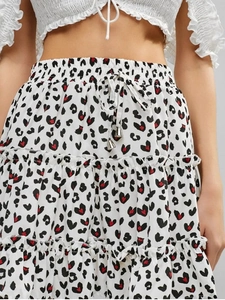 Detail of high waist leopard heart print skirt with layered ruffles and drawstring
