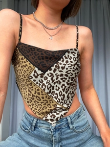 Detail of leopard print crop top with thin straps and vintage bandana hem design