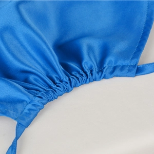 Blue satin halter top featuring elastic ruched details and a silky finish on white background