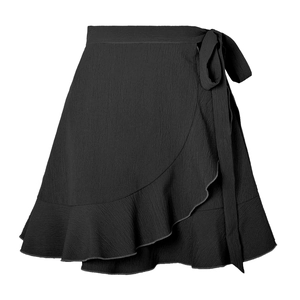 Detail of black wrap mini skirt showing crepe texture fabric and ruffled hemline
