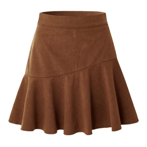 Detail of high waist corduroy skirt showing brown fabric texture and pleated hem