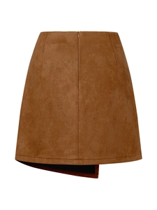 Detail view of caramel faux suede mini skirt featuring high-waisted asymmetrical hem
