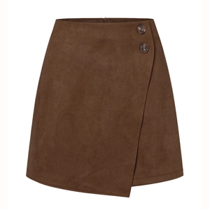 Detail of coffee brown suede mini skirt featuring high waist and asymmetric button wrap