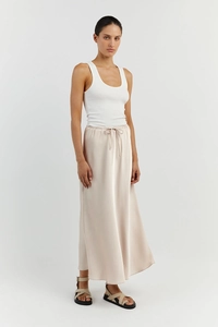 Detail of high-waist champagne satin maxi skirt with adjustable drawstring waistband