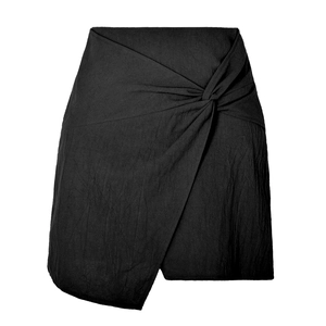 Jupe courte taille haute en coton lin noir avec nœud drapé et ourlet asymétrique