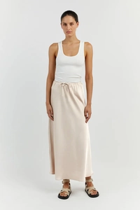 Detailed texture of beige satin long skirt featuring high waist with drawstring closure