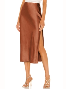 Detail view of high-waist acetate satin midi skirt featuring an elegant side slit