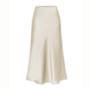Detail of high-waisted champagne satin midi skirt showing smooth glossy silk texture