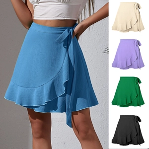 High-waisted solid color wrap skirt with ruffle hem and waist tie in dark blue finish