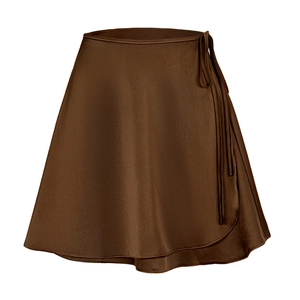 Detail of coffee brown satin wrap skirt showing delicate side tie and wavy ruffled hemline