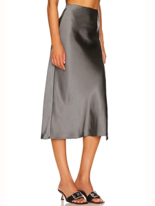 Close-up of grey satin midi skirt with high waist and elegant slit showing silky texture